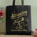 a black tote bag with a picture of a telescope on it